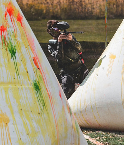 guy playing paintball