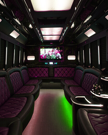 large party bus interior with couches